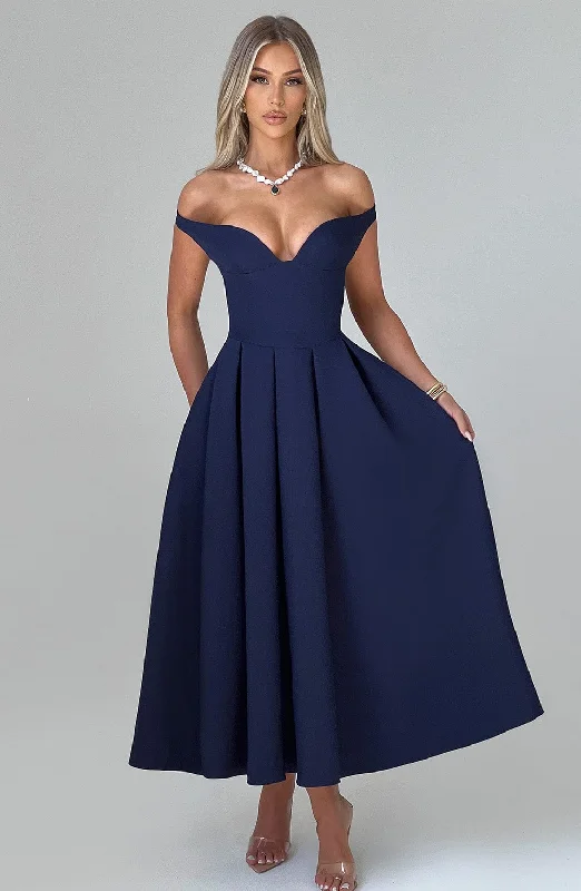 Midi dresses with ribbed textures for a unique and tactile appearance Lanetta Midi Dress - Navy Midi dresses with ribbed textures for a unique and tactile appearance Lanetta Midi Dress - Navy
