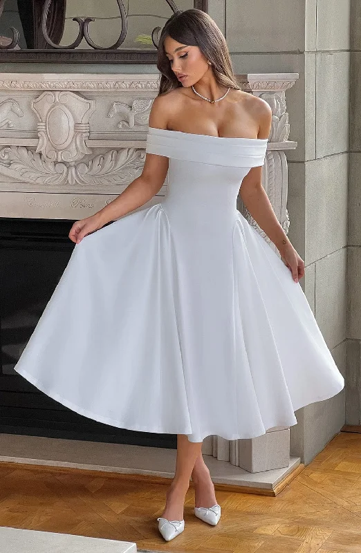Midi dresses with geometric cutouts for a contemporary and edgy look Miranda Midi Dress - Ivory Midi dresses with geometric cutouts for a contemporary and edgy look Miranda Midi Dress - Ivory