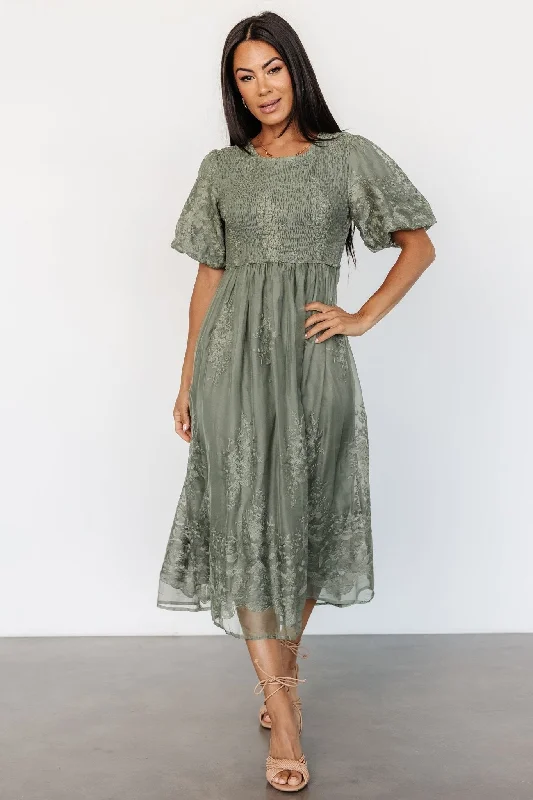 Midi dresses with bow accents for a sweet and charming look Corrine Embroidered Midi Dress | Deep Sage Midi dresses with bow accents for a sweet and charming look Corrine Embroidered Midi Dress | Deep Sage