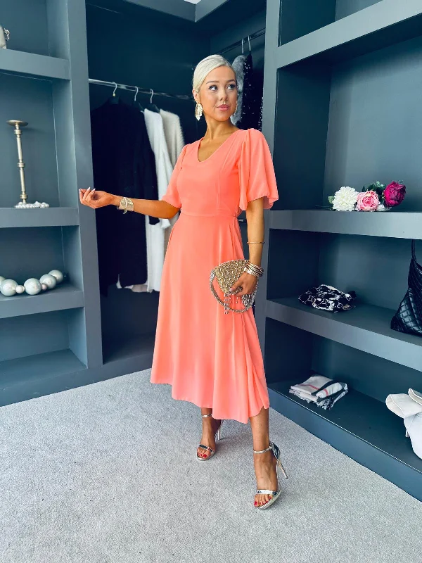 Midi dresses with one - shoulder designs for a modern and asymmetric style Clodagh V Neck Midi Dress Peach Midi dresses with one - shoulder designs for a modern and asymmetric style Clodagh V Neck Midi Dress Peach