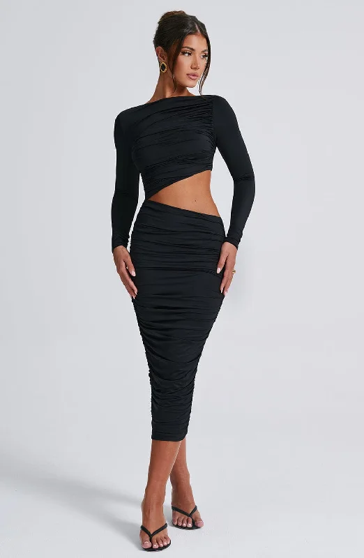 Midi dresses with geometric cutouts for a contemporary and edgy look Rylee Midi Dress - Black Midi dresses with geometric cutouts for a contemporary and edgy look Rylee Midi Dress - Black