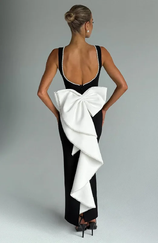 Midi dresses with pom - pom trims for a playful and festive look Lana Midaxi Dress - Black/White Midi dresses with pom - pom trims for a playful and festive look Lana Midaxi Dress - Black/White