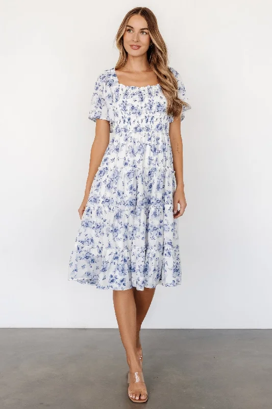 Midi dresses with puff sleeves for a vintage - inspired look Lilla Tiered Midi Dress | Off-White + Blue Floral Midi dresses with puff sleeves for a vintage - inspired look Lilla Tiered Midi Dress | Off-White + Blue Floral