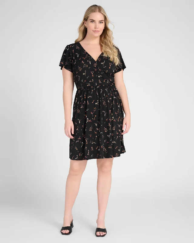 Mini dresses with patchwork designs for a unique style Plus Size Short Sleeve Faux Wrap Mini Dress Mini dresses with patchwork designs for a unique style Plus Size Short Sleeve Faux Wrap Mini Dress