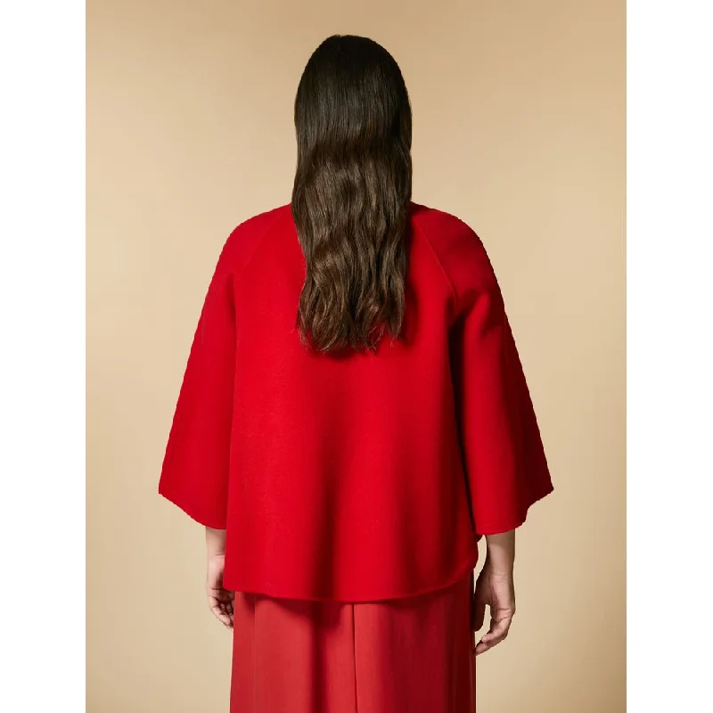 Oversized women's wool coats in a monochromatic look for a trendy outfitNOA