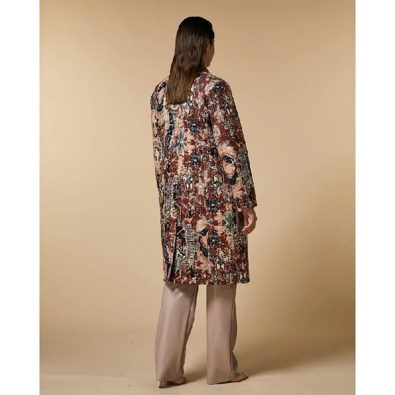Oversized women's wool coats in a monochromatic look for a trendy outfitTEORIA
