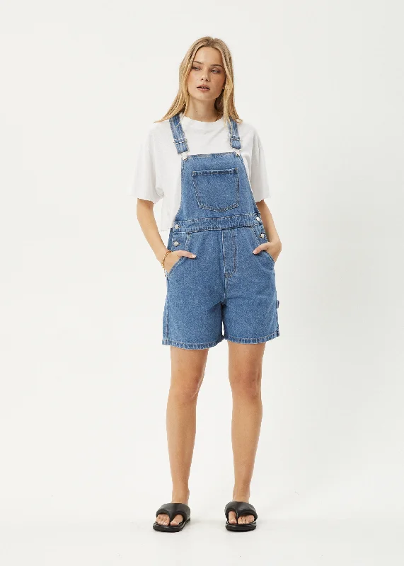 Women jumpsuits with tassel trims for a playful and fashionable touchAFENDS Womens Lil Louis - Denim Overall - Worn Blue Women jumpsuits with tassel trims for a playful and fashionable touchAFENDS Womens Lil Louis - Denim Overall - Worn Blue