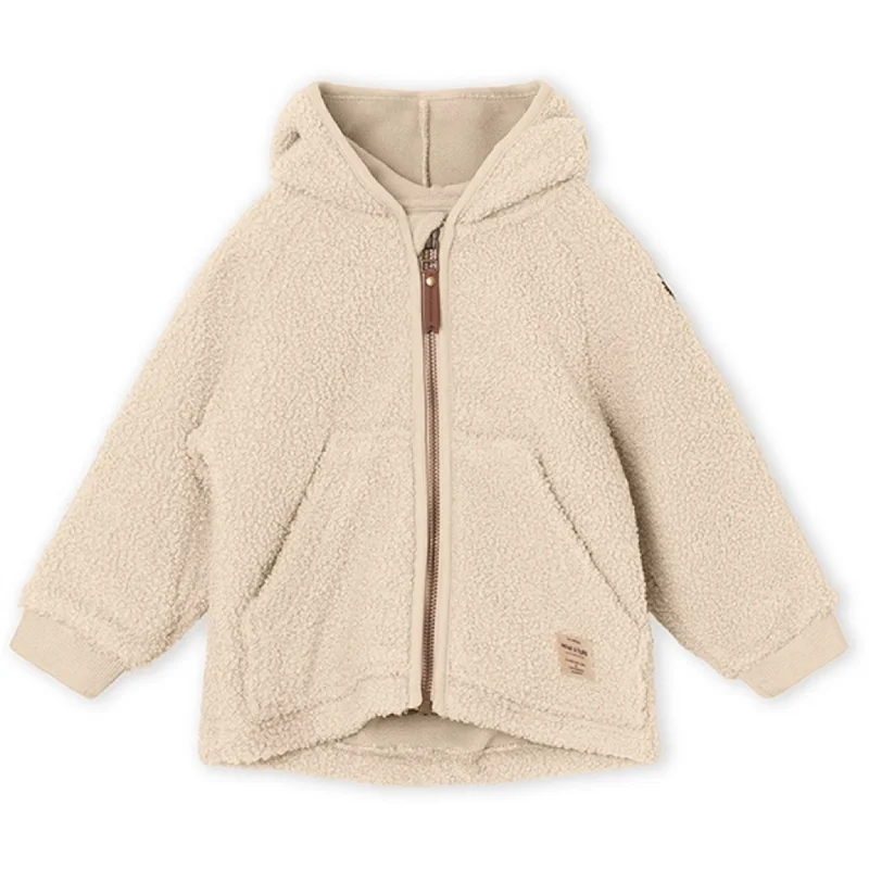 Women's cropped down jackets in bold colors for a sporty and fashionable winter outfitMINI A TURE Liff Teddy Fleece Jacket Sand Dollar Women's cropped down jackets in bold colors for a sporty and fashionable winter outfitMINI A TURE Liff Teddy Fleece Jacket Sand Dollar