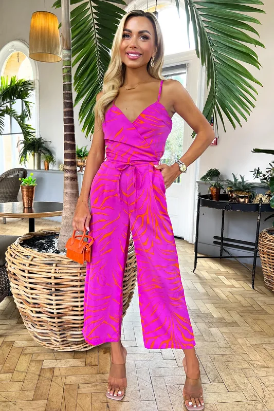 Denim women jumpsuits with ripped details for a casual - edgy lookPink and Orange Printed Wrap Top Tie Waist Full Length Jumpsuit Denim women jumpsuits with ripped details for a casual - edgy lookPink and Orange Printed Wrap Top Tie Waist Full Length Jumpsuit