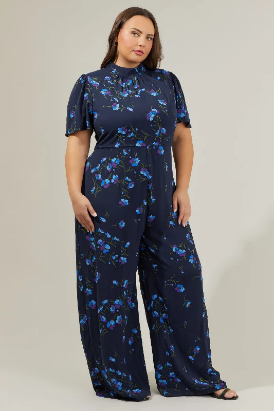 Metallic women jumpsuits for a dazzling New Year's Eve partyTorun Floral Mock Neck Wide Leg Jumpsuit Curve Metallic women jumpsuits for a dazzling New Year's Eve partyTorun Floral Mock Neck Wide Leg Jumpsuit Curve