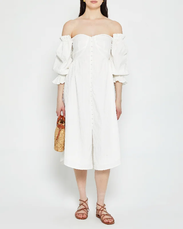 Midi dresses with ruffled hems for a romantic date nightAna Cotton Dress