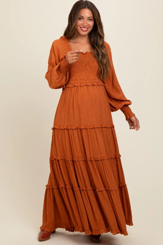 Midi dresses with keyhole backs for a flirty and unexpected detailCamel Smocked Long Sleeve Ruffle Tiered Maternity Maxi Dress Midi dresses with keyhole backs for a flirty and unexpected detailCamel Smocked Long Sleeve Ruffle Tiered Maternity Maxi Dress