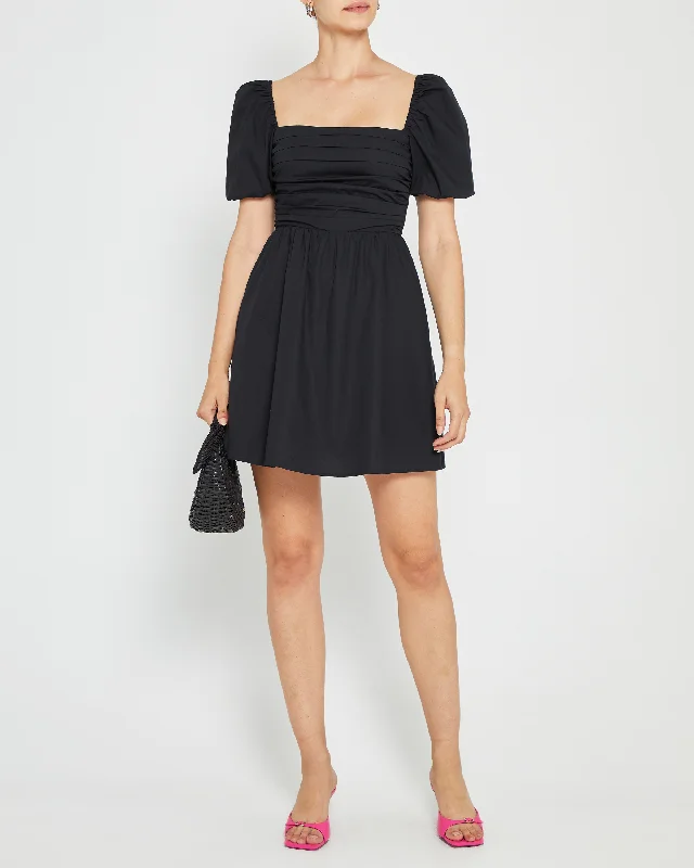 Midi dresses with geometric cutouts for a contemporary and edgy lookRiver Mini Dress Midi dresses with geometric cutouts for a contemporary and edgy lookRiver Mini Dress