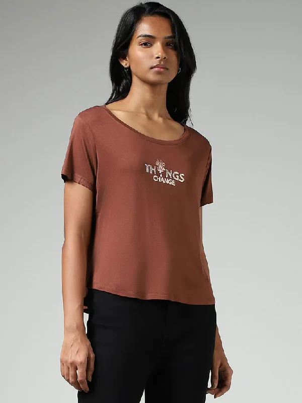 Women's designer brand pants High - rise flare women jeans for a 70s - inspired look LOV Chocolate Brown Typographic Printed T-Shirt Women's designer brand pants High - rise flare women jeans for a 70s - inspired look LOV Chocolate Brown Typographic Printed T-Shirt