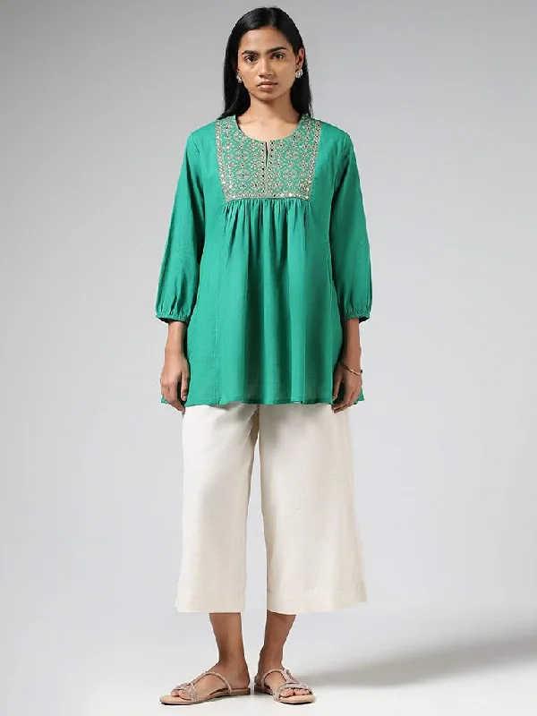 Women's button - fly jeans pants Wide - leg women jeans for a modern and relaxed vibe Utsa Aqua Green Mirror Embroidered Cotton Gathered Kurti Women's button - fly jeans pants Wide - leg women jeans for a modern and relaxed vibe Utsa Aqua Green Mirror Embroidered Cotton Gathered Kurti