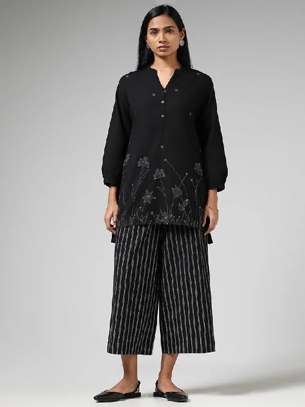 Women's designer brand pants High - rise flare women jeans for a 70s - inspired look Utsa Black Floral Printed High Low Kurti Women's designer brand pants High - rise flare women jeans for a 70s - inspired look Utsa Black Floral Printed High Low Kurti