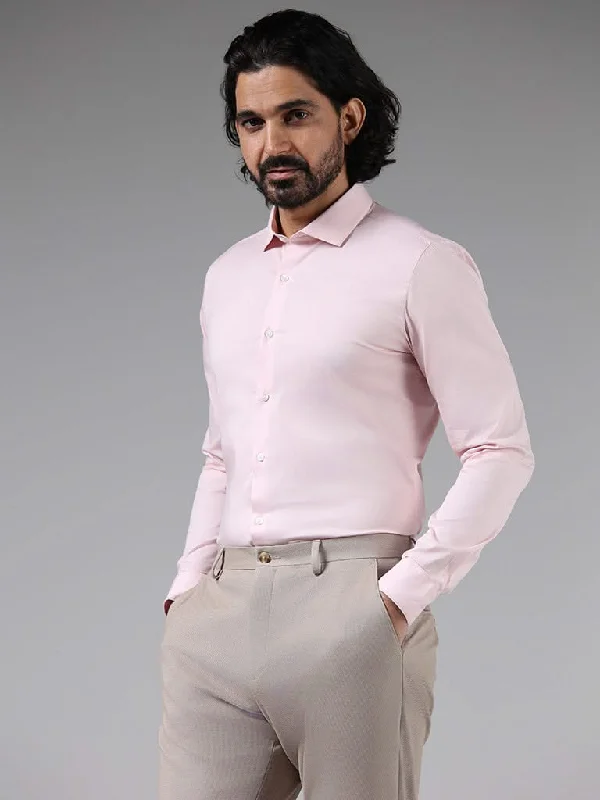 Women's low - rise denim pants Distressed women jeans for a trendy and edgy look WES Formals Solid Light Pink Cotton Blend Ultra-Slim Fit Shirt Women's low - rise denim pants Distressed women jeans for a trendy and edgy look WES Formals Solid Light Pink Cotton Blend Ultra-Slim Fit Shirt