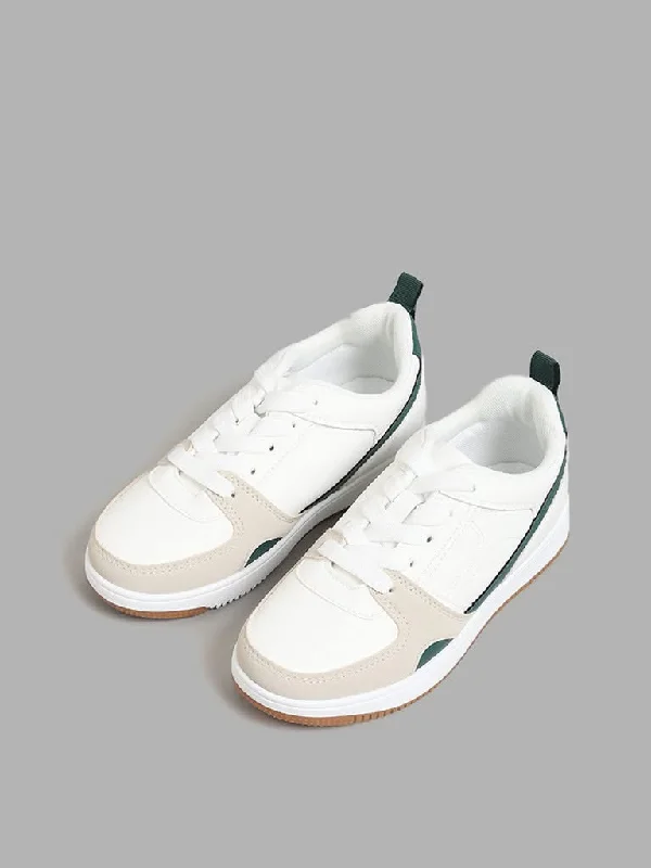 Women's low - rise denim pants Distressed women jeans for a trendy and edgy look Yellow White & Green Colour-Block Sneakers Women's low - rise denim pants Distressed women jeans for a trendy and edgy look Yellow White & Green Colour-Block Sneakers