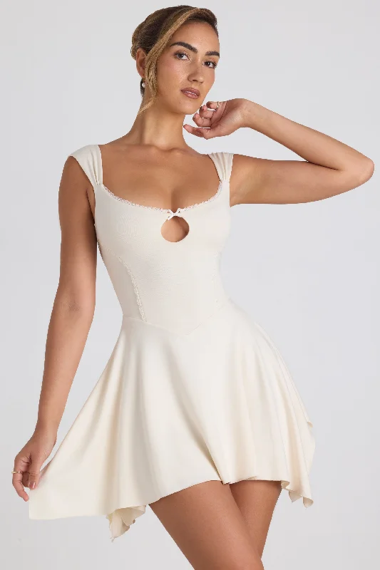 Mini dresses with bow accents for a sweet lookModal Asymmetric Lace-Trim A-Line Mini Dress in Ivory Mini dresses with bow accents for a sweet lookModal Asymmetric Lace-Trim A-Line Mini Dress in Ivory