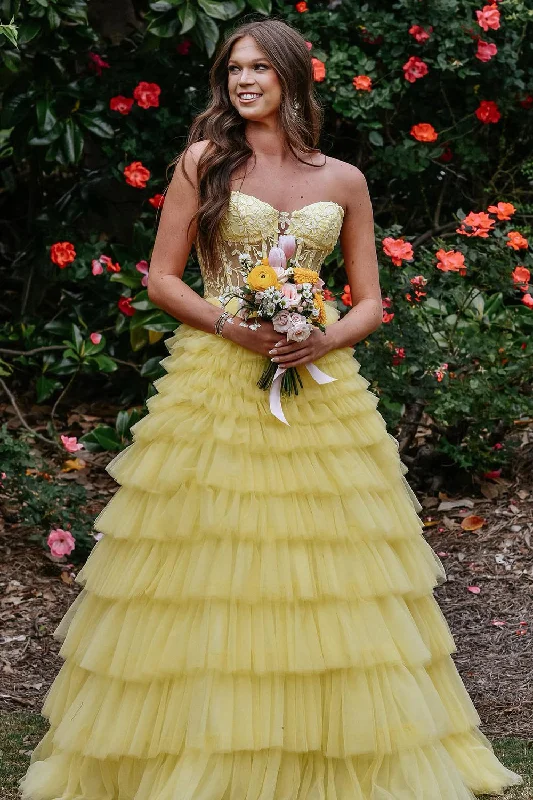 Party dresses with a peplum waist for a feminine and flattering silhouetteSparkly Yellow A-Line Strapless Corset Tiered Long Prom Dress with Appliques Party dresses with a peplum waist for a feminine and flattering silhouetteSparkly Yellow A-Line Strapless Corset Tiered Long Prom Dress with Appliques