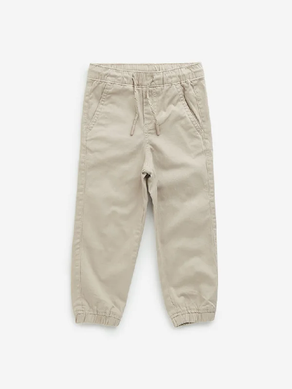 Cargo Women Shorts with Multiple Pockets for FunctionalityHOP Kids Beige Solid Mid-Rise Cotton Blend Joggers