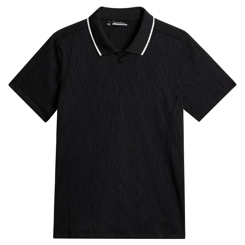 Zip - off sleeves polo shirt for changing weather conditionsWomens Izara Wave Rib Jersey Polo Black - AW24 Zip - off sleeves polo shirt for changing weather conditionsWomens Izara Wave Rib Jersey Polo Black - AW24