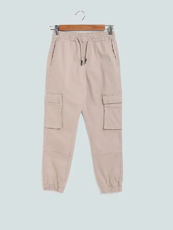 Solid Color Women Shorts in Bright Hues for a Bold StatementY&F Kids Beige Plain Elasticated Joggers Solid Color Women Shorts in Bright Hues for a Bold StatementY&F Kids Beige Plain Elasticated Joggers