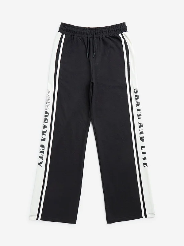 Bermuda Women Shorts for a Classic and Sophisticated LookY&F Kids Black Text Design Mid-Rise Track Pants Bermuda Women Shorts for a Classic and Sophisticated LookY&F Kids Black Text Design Mid-Rise Track Pants