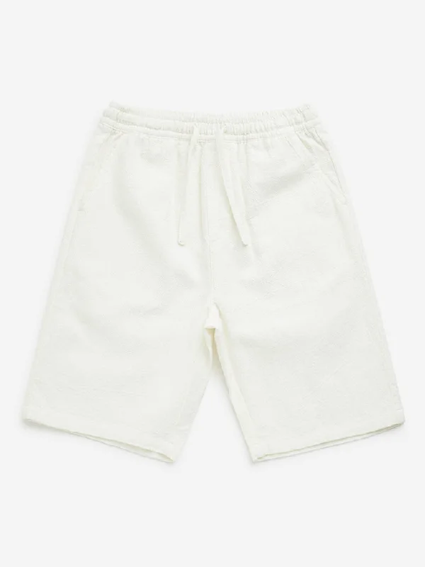 Belted Women Shorts to Enhance the WaistlineY&F Kids Off-White Textured Mid-Rise Cotton Shorts Belted Women Shorts to Enhance the WaistlineY&F Kids Off-White Textured Mid-Rise Cotton Shorts